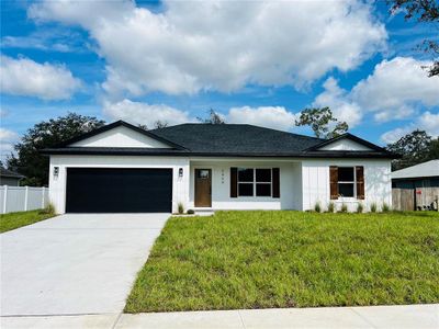 New construction Single-Family house 2464 Newmark Drive, Deltona, FL 32738 - photo 0