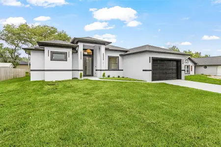 New construction Single-Family house 571 Presque Isle Dr, Port Charlotte, FL 33954 - image