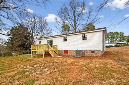 New construction Single-Family house 720 Woodland Cir, Loganville, GA 30052 - image