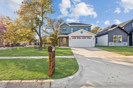 View of front of property featuring a front yard