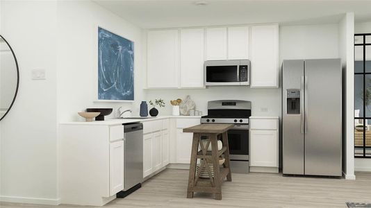 Kitchen with light hardwood / wood-style floors, sink, white cabinetry, and stainless steel appliances