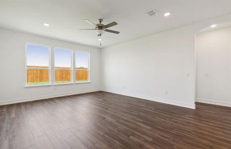 Airy gathering room with large windows *real home pictured