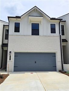 New construction Townhouse house 1109 Holland Rose Dr, Lawrenceville, GA 30043 Sawnee- photo 0