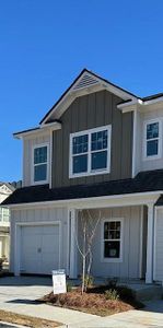 New construction Townhouse house 201 Towhee Drive, Ball Ground, GA 30107 - photo 0