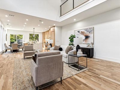 Living room featuring sink and light hardwood / wood-style floors