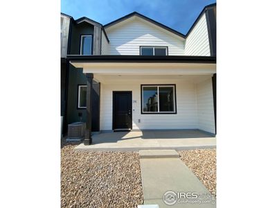 New construction Townhouse house 3708 Sequoia Ct, Evans, CO 80620 - photo 0