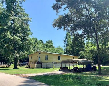 New construction Single-Family house 601 Faulkner Avenue, Coldspring, TX 77331 - photo 0