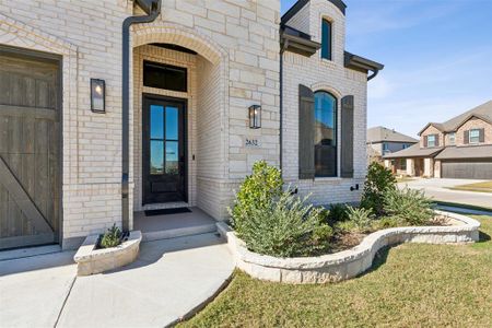 Entrance to property featuring a garage