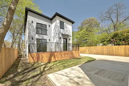 Rear view of house featuring a patio, fence private yard, and stucco siding