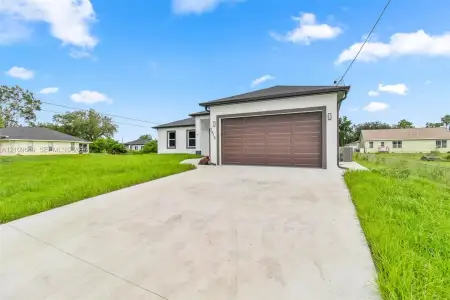 New construction Single-Family house 2818 42Nd St Sw, Lehigh Acres, FL 33976 - image