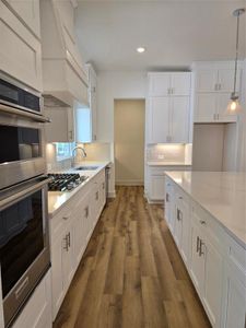 No shortage of storage or prep space in this lovely kitchen!