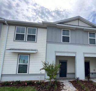 New construction Townhouse house 1281 Blue Island Drive, Clermont, FL 34714 - photo 0