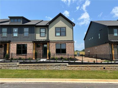 New construction Townhouse house 303 Barracks Wy, Unit 885, Hoschton, GA 30548 plan Ivey - image