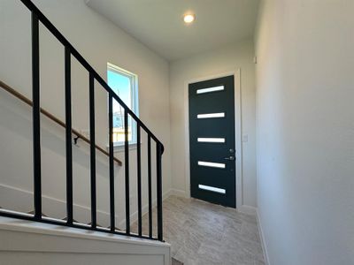 1st Floor - Entry Foyer.*Photos of previous model with similar floor plan.  Finishes will be based on spec for Erin Park community.*