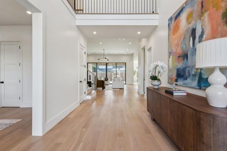 Foyer entrance featuring light hardwood / wood-style flooring