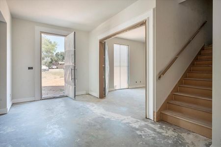 Entrance with office and Staircase to 2nd floor.