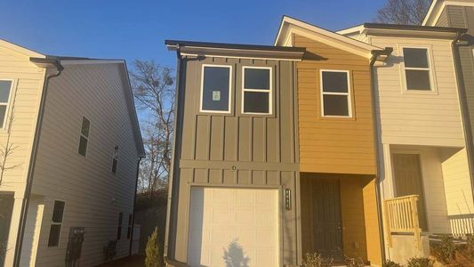 New construction Townhouse house 1686 Gunnin Trce Nw, Atlanta, GA 30318 Indigo- photo 0