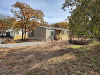 New construction Manufactured Home house 1608 Quail Run, Pelican Bay, TX 76020 - photo 0