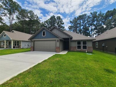 New construction Single-Family house 21 Firewood Road, Huntsville, TX 77340 - photo 0