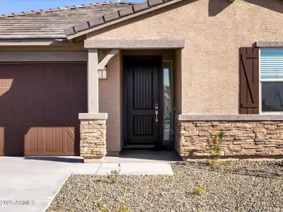 New construction Single-Family house 16076 W Prickly Pear Trl, Surprise, AZ 85387 Sawyer- photo 1 1