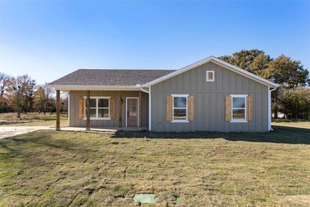 View of front of house with a front lawn