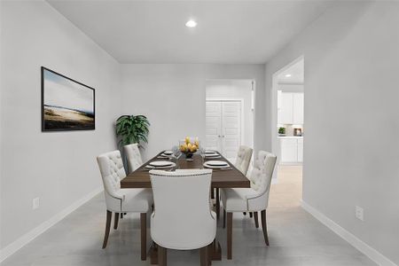 Make memories gathered around the table with your family and friends! This dining room features high ceilings, custom paint, and gorgeous flooring.