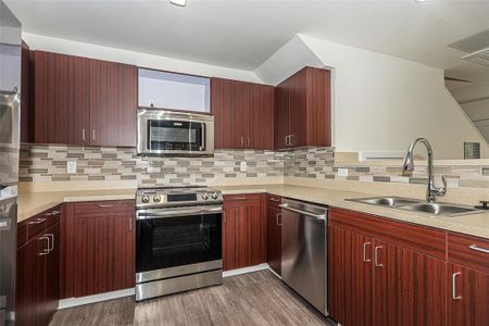 Kitchen has lots of cabinet space