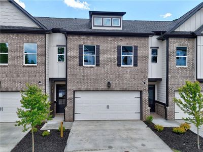 New construction Townhouse house 5702 Urban Village Wy, Unit 2, Tucker, GA 30084 Sweetwater- photo 0