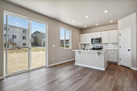 New construction Single-Family house 9998 Racine St, Commerce City, CO 80022 Fraser- photo 8 8