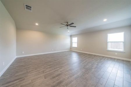 Large living room is open to the kitchen and dining area