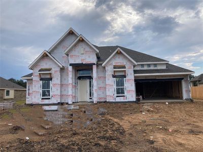 One-story home with 4 bedrooms, 3 baths and 3 car tandem garage