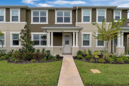 New construction Townhouse house 11554 Buoy Point Place, Orlando, FL 32832 - photo 0