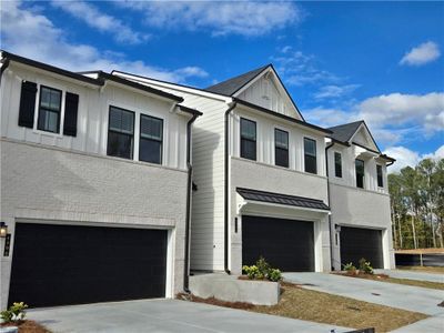 New construction Townhouse house 1942 Westwind St, Lawrenceville, GA 30043 - photo 0