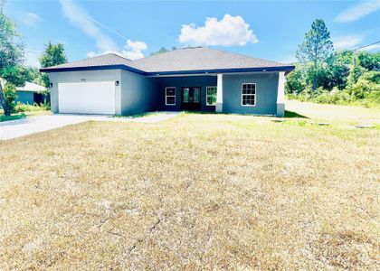 New construction Single-Family house 12456 House Finch Road, Weeki Wachee, FL 34614 - photo 0