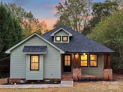 New construction Single-Family house 3 Riverside Street, Lowell, NC 28098 - photo 0