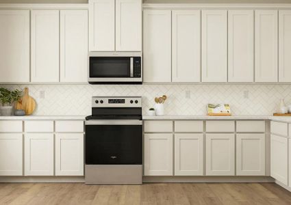 Rendering of the spacious kitchen in the
  Superior floor plan. The kitchen has white cabinetry, herringbone tile
  backsplash, granite counters and stainless steel Whirlpool brand appliances.