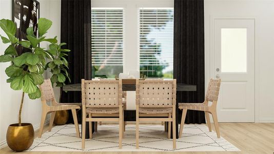 Dining space featuring light hardwood / wood-style flooring