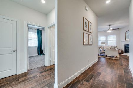 Hallway featuring wood like tile floors