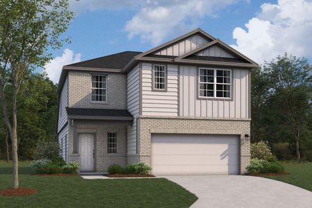 View of front of house featuring a garage and a front yard