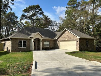 New construction Single-Family house 580 Woodstock Lane, Conroe, TX 77302 - photo 0