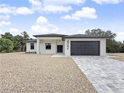 New construction Single-Family house 402 Thompson Ave, Lehigh Acres, FL 33972 - image