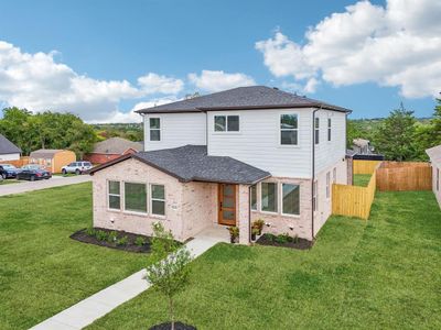 View of front of property with a front yard