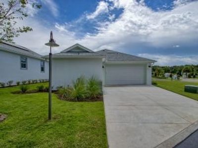 New construction Single-Family house 361 Conch Key Ln, Lady Lake, FL 32159 Sand Dollar Cottage- photo 0 0