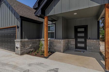 Entrance to property with a garage