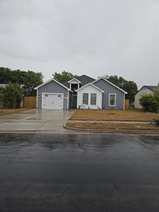 Ranch-style home featuring a garage