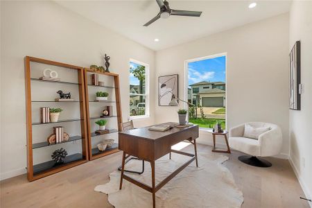 Office featuring light wood-type flooring and ceiling fan