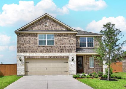 Beautiful brick and stone exterior with front yard landscaping