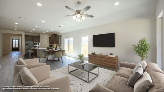 Living area featuring light wood finished floors, visible vents, baseboards, ceiling fan, and recessed lighting