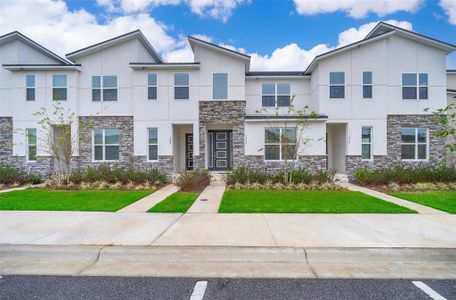 New construction Townhouse house 1852 Tropical Palms Circle, Kissimmee, FL 34747 - photo 0