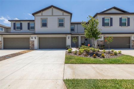 New construction Townhouse house 32100 Pop Ash Pl, San Antonio, FL 33576 Marisol- photo 0